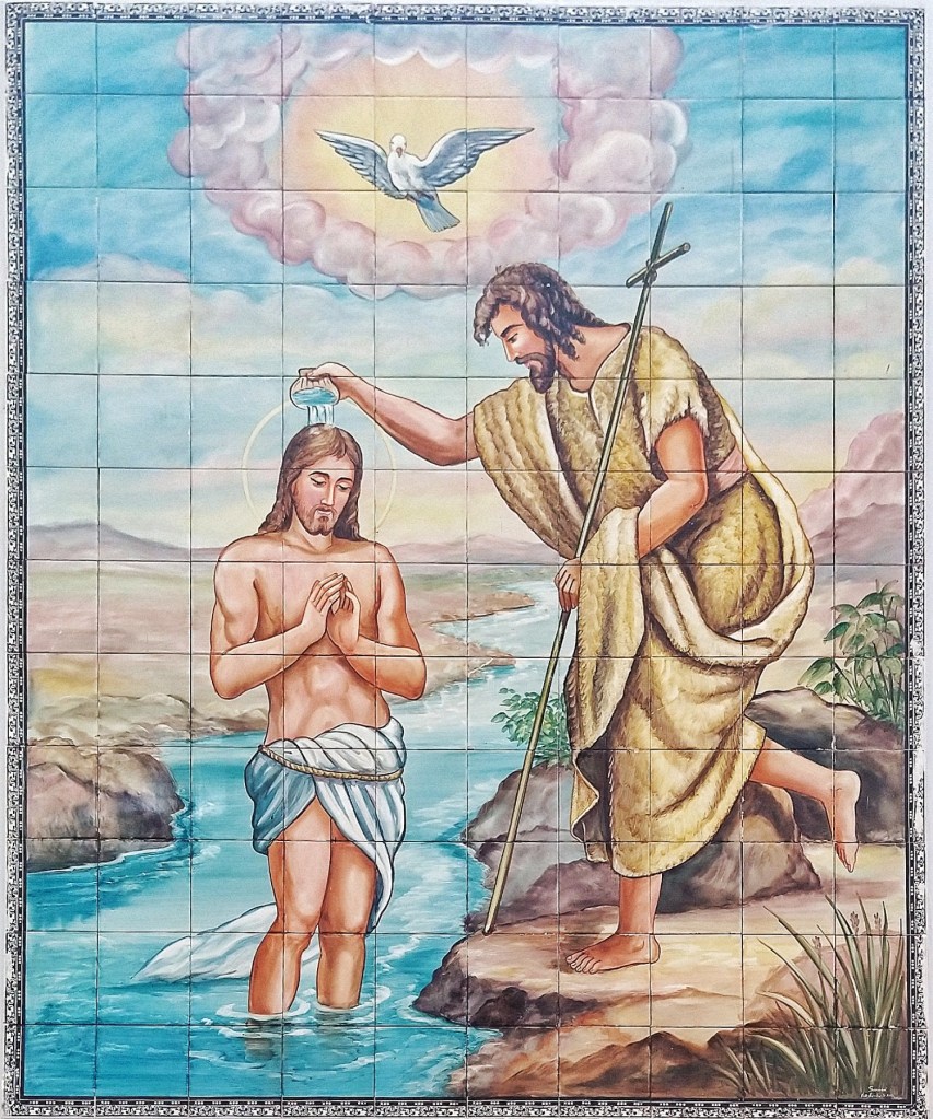 São João Batista batizando Jesus é uma obra que fica localizada acima da pia batismal  da Matriz de São Sebastião, em Barbacena, MG. Foi pintada em 1984 pelo Atelier Artístico Sarasá, localizado em São Paulo.